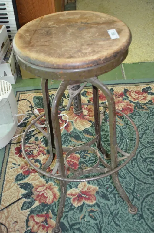 Antique Swiveling Bar Stool