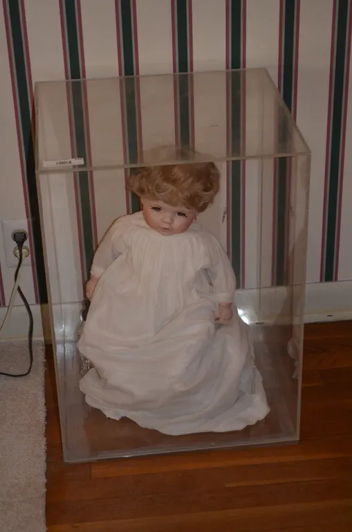 Porcelin Doll in Case