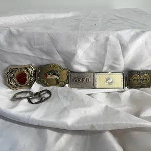 7 METAL BELT BUCKLES IN BOX