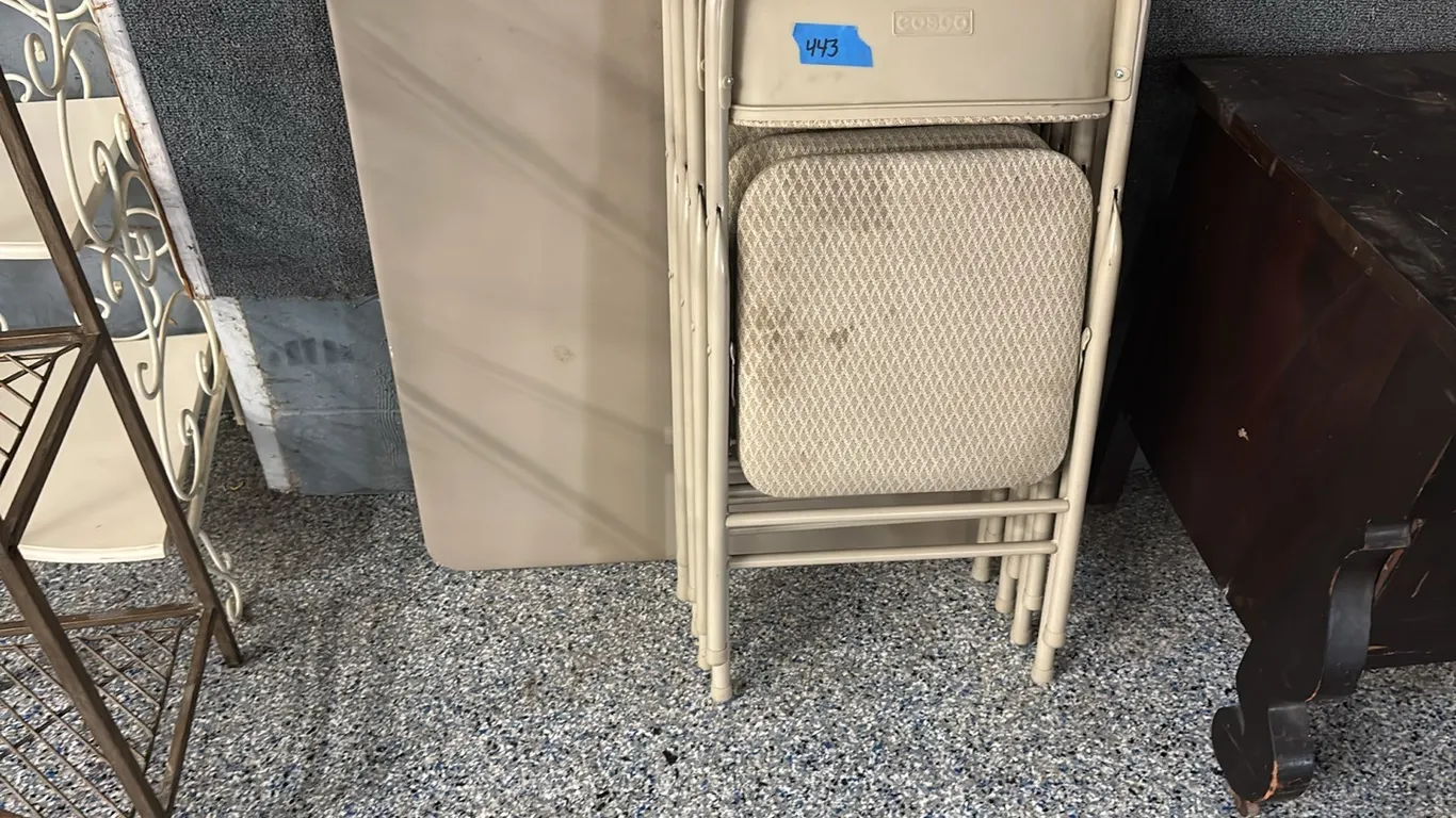 COSCO FOLDING TABLE AND 4 PADDED CHAIRS