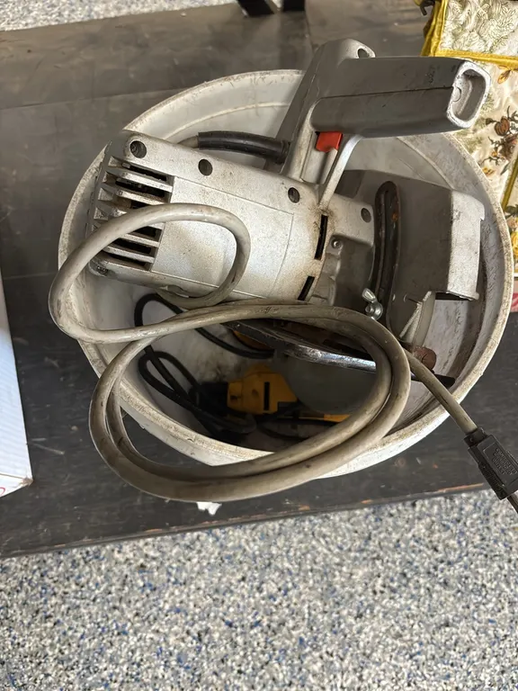 BUCKET WITH BLACK AND DECKER CIRCULAR SAW-DEWALT 3/8 VSR DRILL