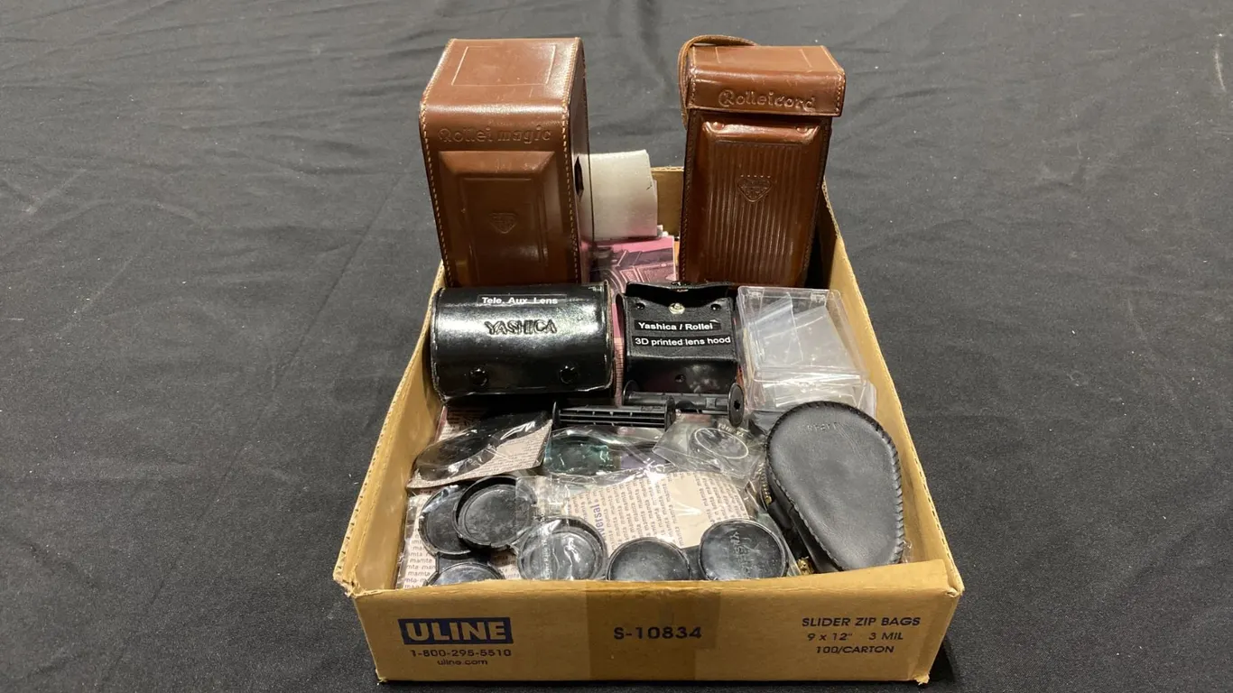 GROUP OF VINTAGE 6X6 TWIN-LENS REFLECTIVE (TLR) CAMERA PARTS, MANUALS AND ACCESSORIES