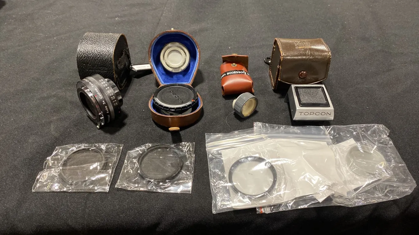 GROUP OF TOPCON ACCESSORIES - WAIST LEVEL FINDER, BODY CAP, ACCESSORY SHOE, TELECONVERTER AND
