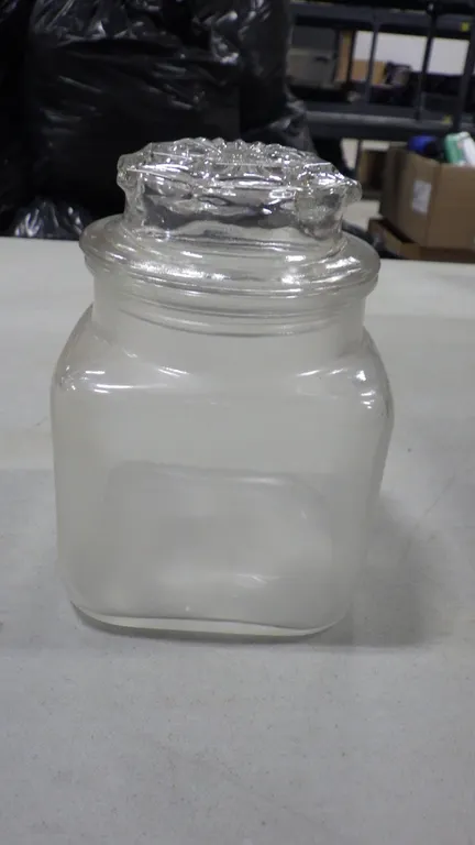 Lot of 12 1lb. glass candy jars with lid (approx. 3.5"x 3.5"x 4")