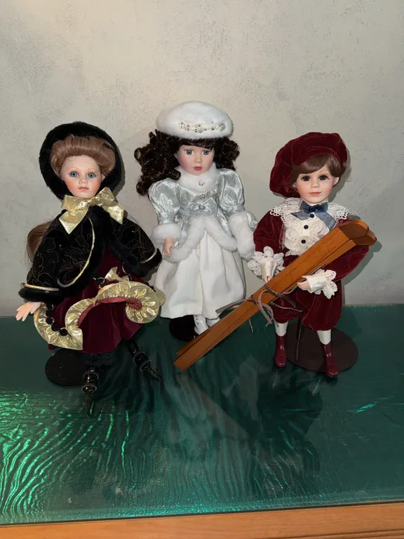 Collection of 3 Porcelain Winter Victorian Style Dolls