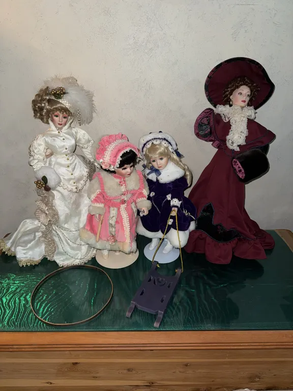 Collection of 4 Porcelain Victorian Style Dolls with Accessories