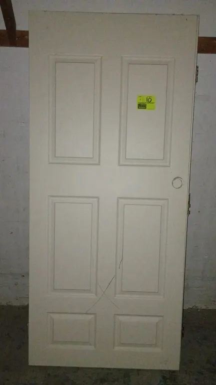 Hollow core doors. Features 6-panel construction, pre-bored doorknob holes, and attached hinges. Dimensions: 36" x 80".
