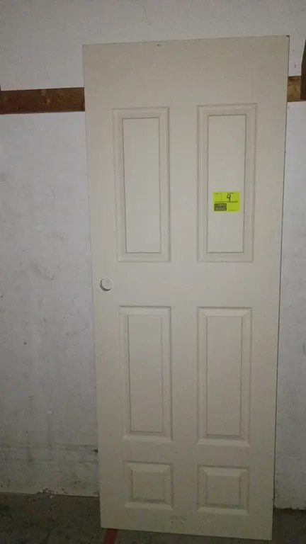 Hollow core interior door slab. Features a 6-panel design and pre-bored lockset hole. 30"W x 80"H.