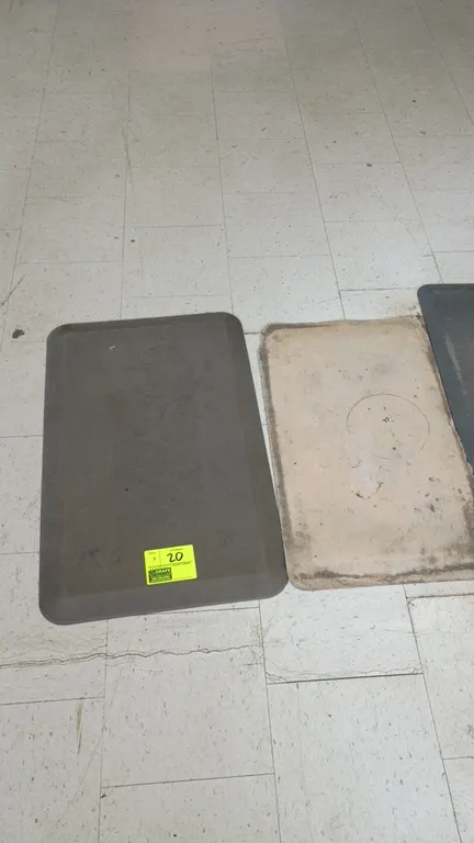 Anti-fatigue floor mats. Features cushioned construction and beveled edges.