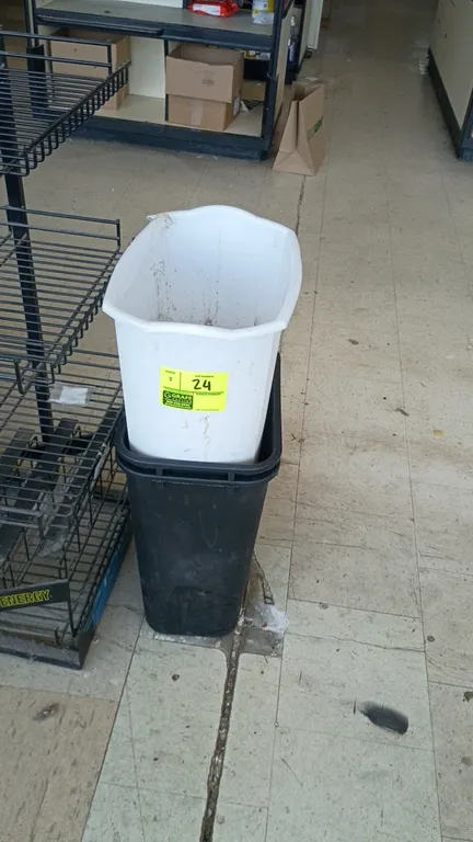 Poly trash cans. Features durable molded plastic construction and open-top design. Includes two black receptacles and one white receptacle.