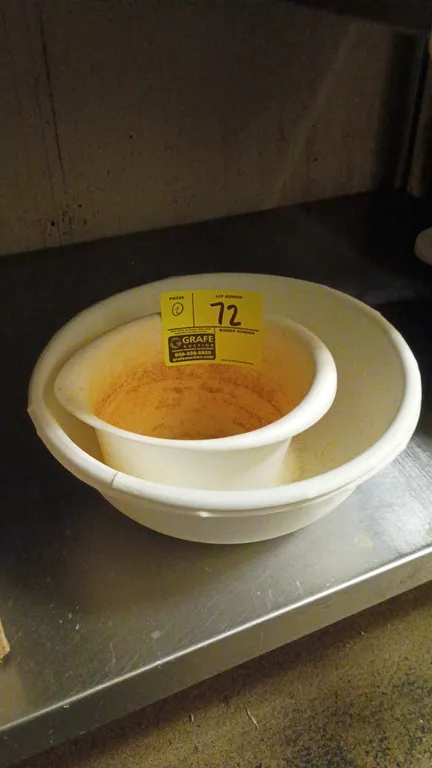 Poly mixing bowls. Set of (2) nested round bowls in assorted sizes. White plastic construction.