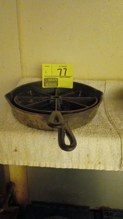 Cast iron skillets. Includes a traditional round skillet with dual pour spouts and an 8-section wedge cornbread pan. Features cast iron construction a