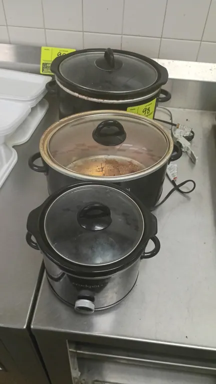 Crock-Pot slow cookers. Features dial temperature controls, side handles, and glass lids. Electrical: 120V. Note: One unit is missing ceramic crock in