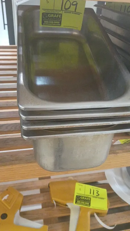Stainless steel food insert pans. Includes (2) 3-quart and (3) 8-quart capacity pans.