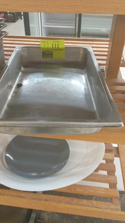 Stainless steel 8.3 qt insert pans. Features commercial stainless steel construction. Surrounding items and display shelving not included.