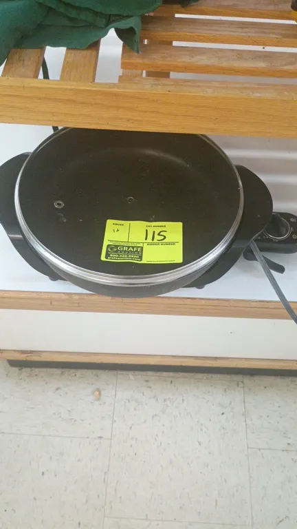 Electric skillet and griddles lot. Includes (1) round electric skillet with glass lid and removable temperature control cord, (1) flat countertop elec