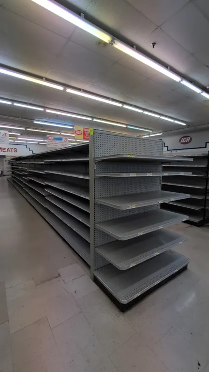 108'L of Madix gondola shelving. Features 72"H uprights with 22"/22" base shelves, adjustable upper metal shelves, and a gray finish. Note: Sold by th