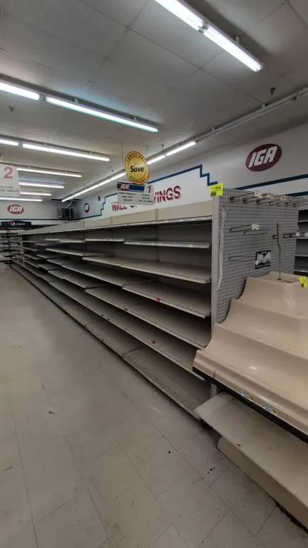 88'L of Madix gondola shelving. Features gray finish, 72"H uprights, 22" and 18" base shelves, and multi-tier adjustable upper shelves. Note: Sold by