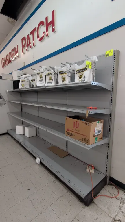 11'L of Madix wall shelving. Features gray finish, 78"H uprights, and 22"D base shelves. Includes upper adjustable shelves and solid back panels. Cont