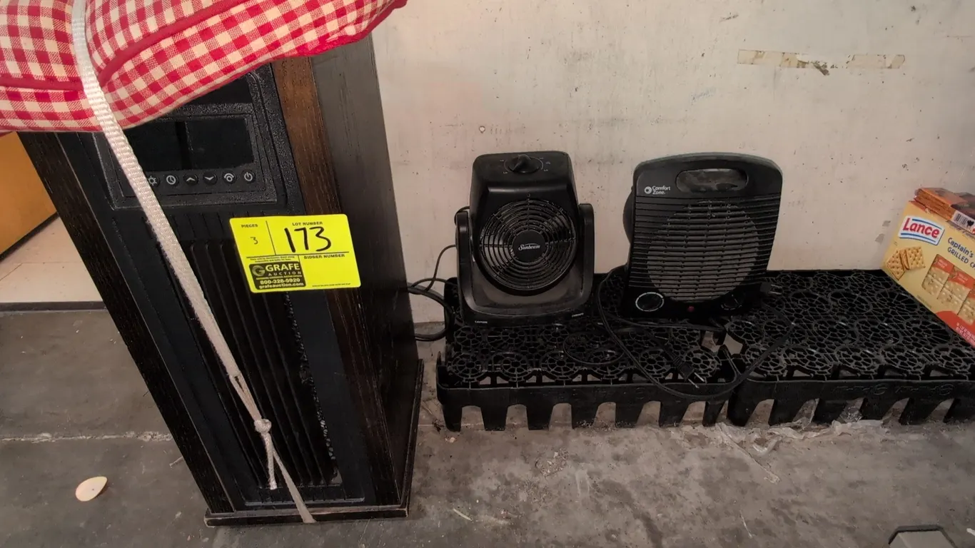 Assorted electric space heaters. Includes (1) Lifesmart HT1216 infrared quartz tower heater with digital display, (1) Sunbeam SFH5963M fan heater, and