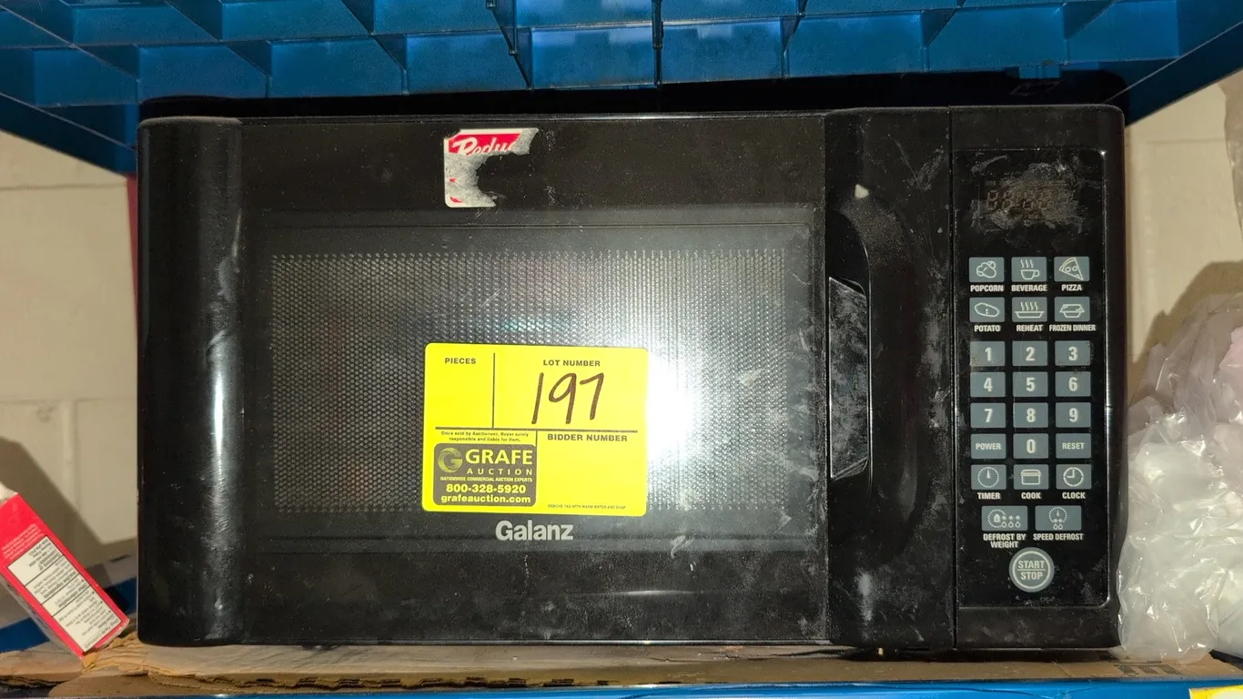 Galanz microwave oven. Features digital touchpad controls with cooking presets and black finish. 17"W. Contents not included.