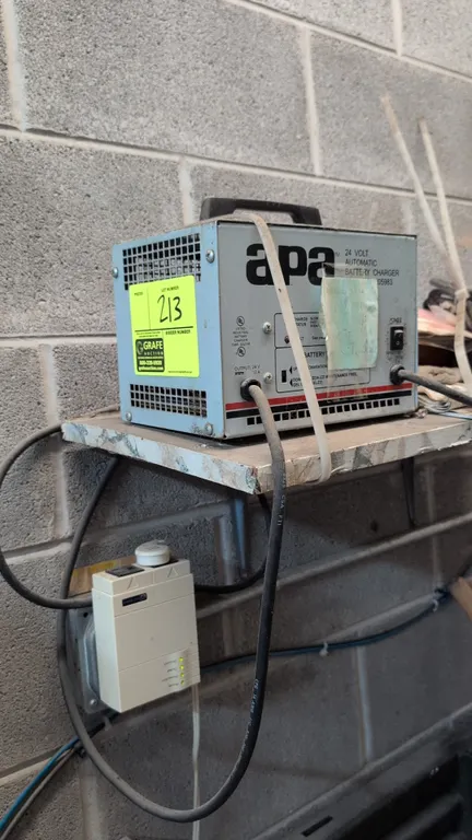 APA 21770 24-volt automatic battery charger. Part no. 205983. Features selectable battery type switch for wet lead-acid or sealed gel cell batteries,