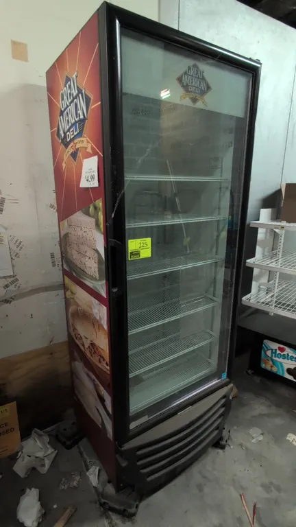 2011 Imbera G319 self-contained glass door display cooler. Features a single hinged glass door, adjustable wire shelving, interior lighting, and Great