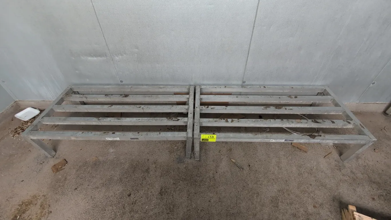Aluminum dunnage racks. Features all-welded tubular aluminum construction with a slatted top and square legs. 4' x 2' each.