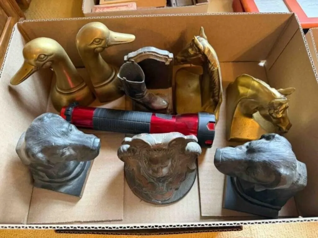 box of book ends, brass and other