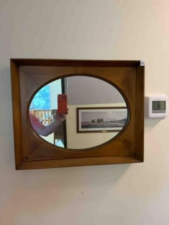Mirror on wall by upstairs bathroom; 17" x 21"