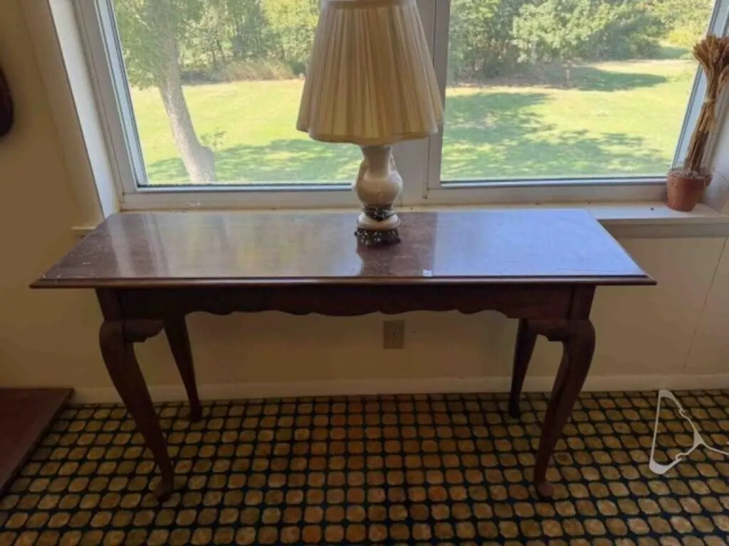 Wood hall table; 16" x 52" x 29"; and table lamp;