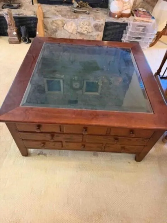 Walnut coffee table with drawers and glass top