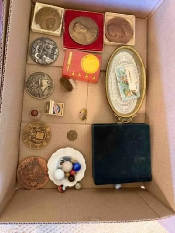 Bronze collector medallions, marbles, etc