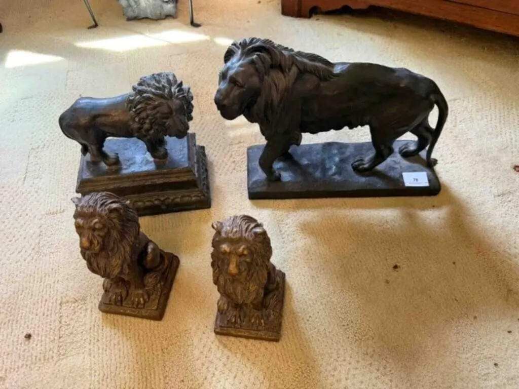 2-lion statues and 2-lion book ends,