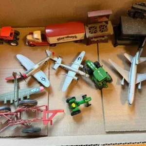 Box of misc. small airplane, tractors,