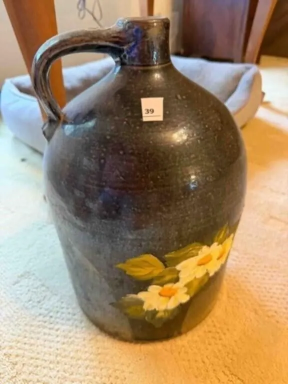 Crock jug with hand painted flowers,