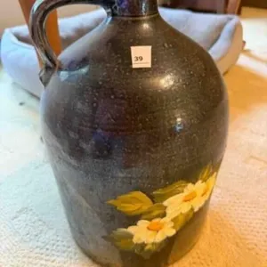 Crock jug with hand painted flowers,