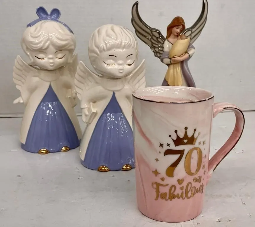 Pair of vintage ceramic kissing angels figurines,