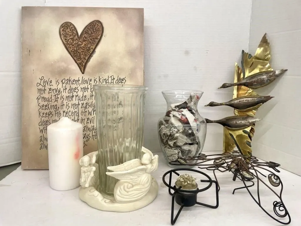 Assorted home decor touches. Includes candles and