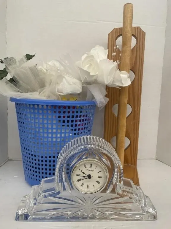 Glass mantle clock, a basket of artificial