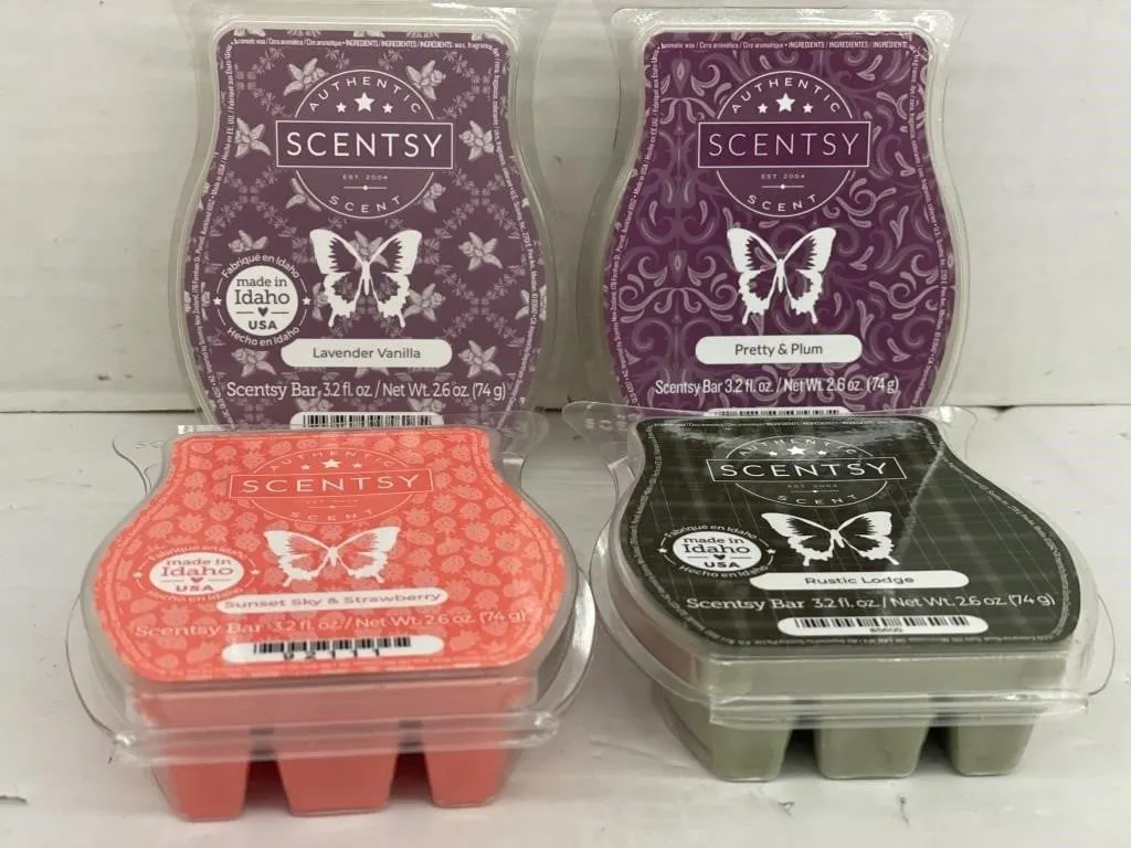 Four unopened Scentsy Bars. Variety of scents.