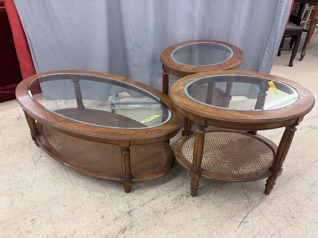 Oval wooden coffee table with a glass top