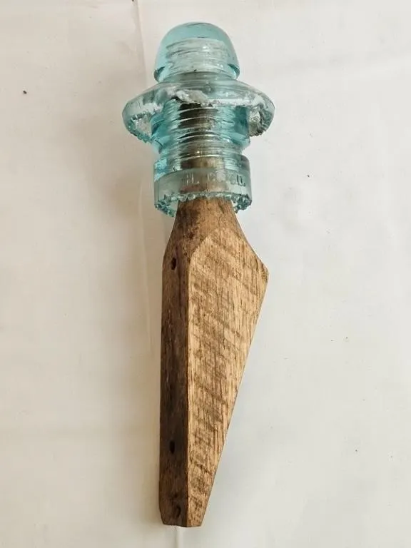 Vintage Aqua Glass Insulator on Wood