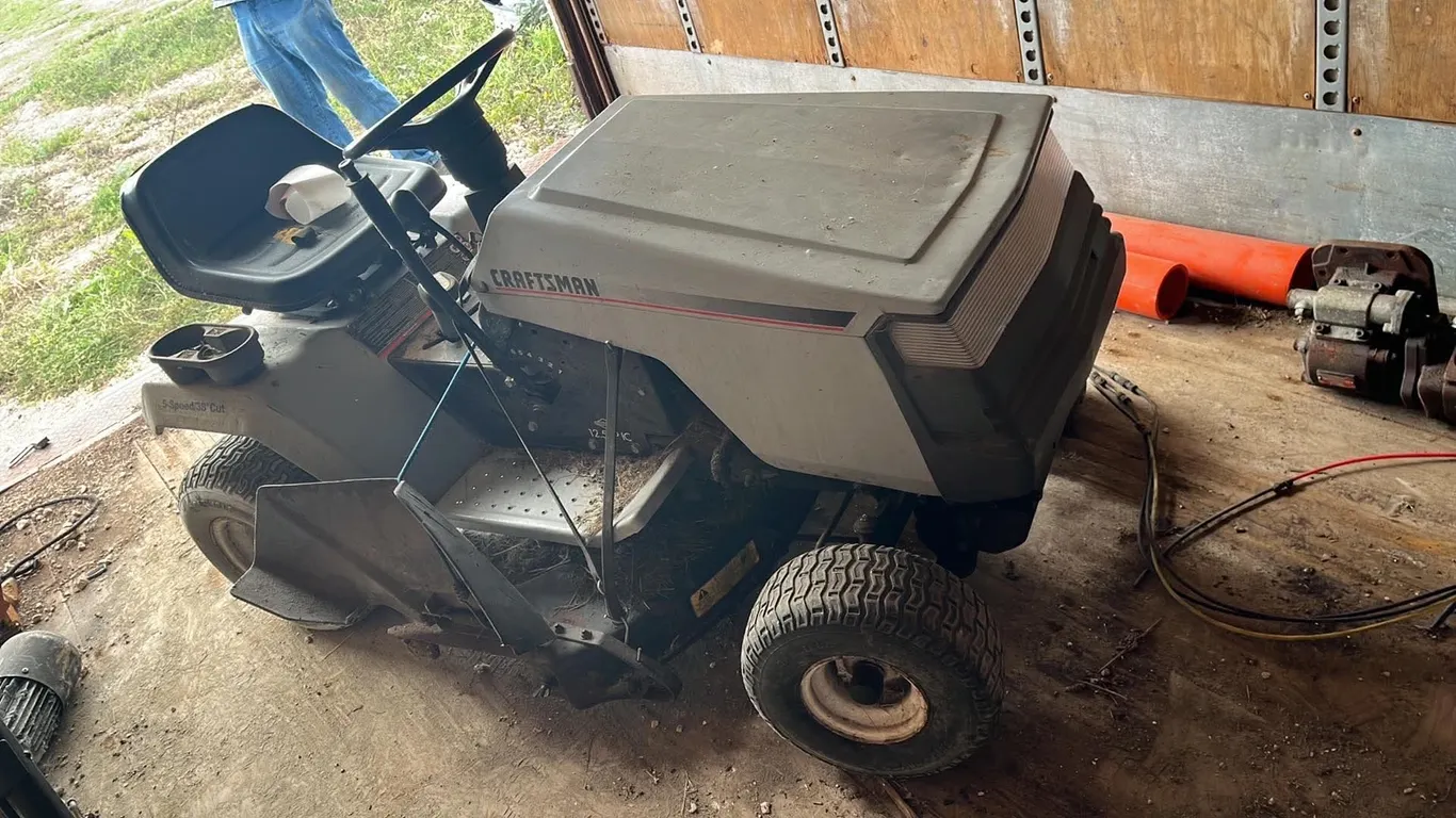 OFFSITE - Craftsman riding mower, 12.5 hp Briggs and Stratton engine. In working condition. Needs new battery and blades, 1 front tire looses air afte