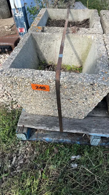 OFFSITE - 2 concrete planters, 21.5”x21.5”x16” high. In good condition