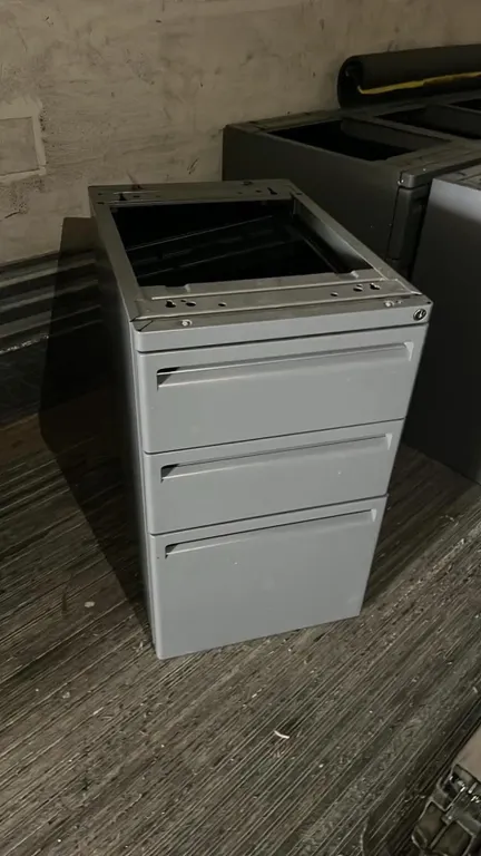 OFFSITE - 4 Metal under desk cabinets , stackable and can be used as tool boxes, each cabinet has 3 drawers, 25” high , 15.5” wide and 23” deep each.