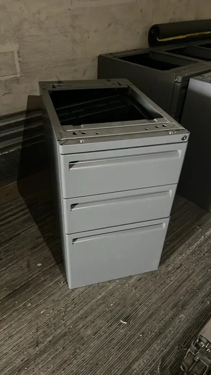 OFFSITE - 4 Metal under desk cabinets , stackable and can be used as tool boxes, each cabinet has 3 drawers, 25” high , 15.5” wide and 23” deep each.