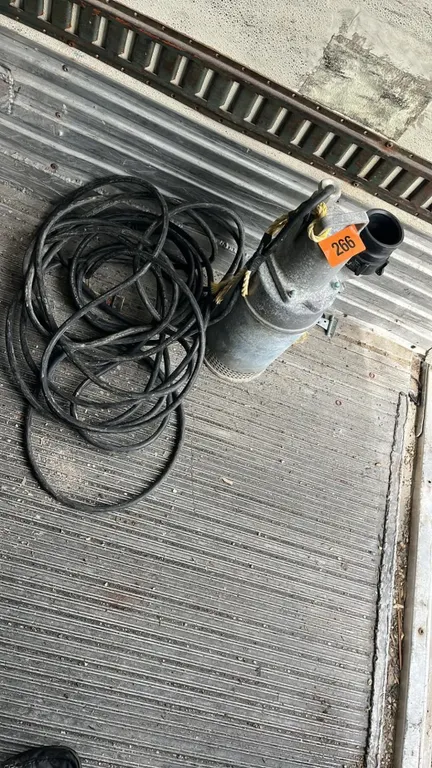 OFFSITE - Large submersible pump with 3” banjo fitting and 50’ of cord. 120 Volt, Was working when removed.