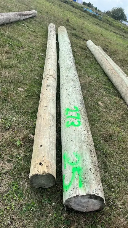 OFFSITE - 2 hydro poles, 25’ long each.