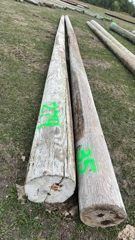 OFFSITE - 2 hydro poles, 1 is 34’ long and one is 35’ long.